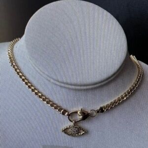 18k Gold Filled with cubic Zirconia Eye charm and curb link choker Necklace .